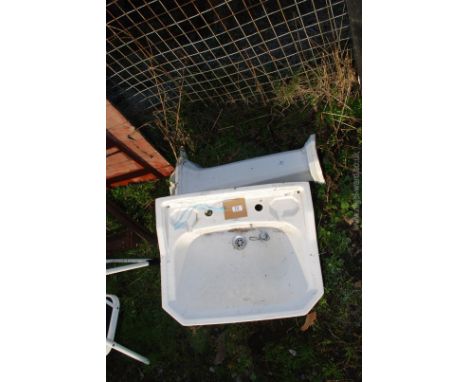 A Heritage bathroom basin with pedestal 24'' x 19 1/2'' deep.