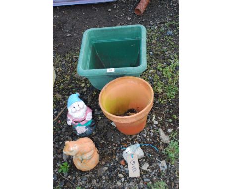 Plastic garden planter, flower pot and garden ornament.