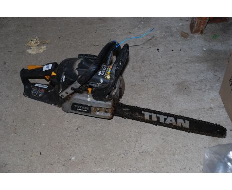 A Titan model TTL 632 CHN petrol chainsaw, not started but has good compression.