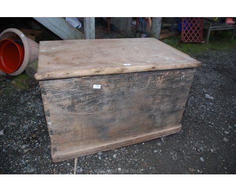 A large wooden trunk (lid a/f.) 37" x 24" x 24".
