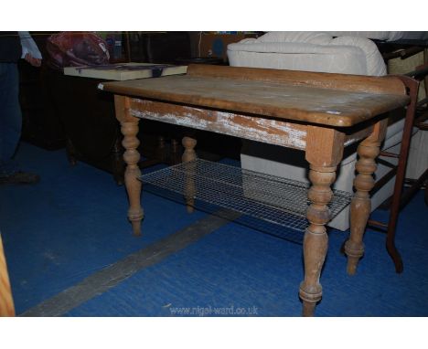 A pine kitchen side table on turned legs, 4' x 2' x 31" high.