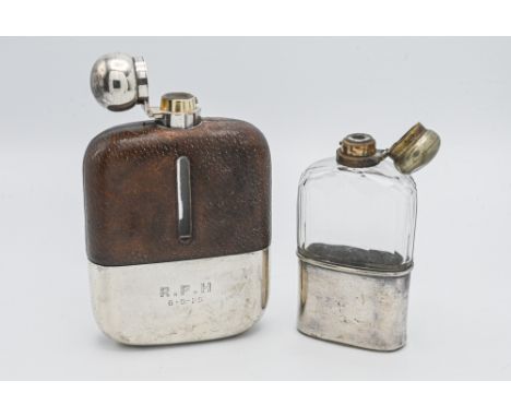 A large George V silver glass and leather hip flask James Dixon &amp; Son, maximum height 18cm, width 11.5cm together with a 