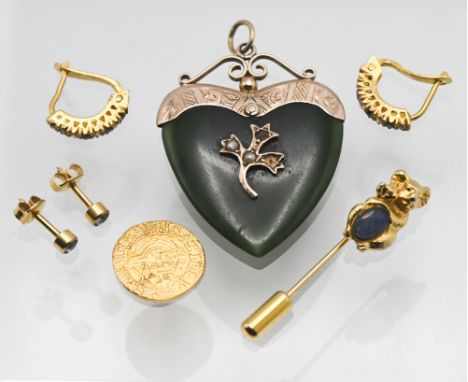 Various small gold items including gilt novelty coin, a 9ct mounted and green jade? Pendant, pair of yellow metal earrings wi
