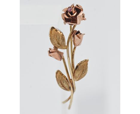 A 9ct gold brooch in a form of a rose with a ruby stone, approx. 3.6g