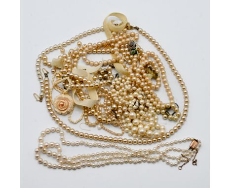 A two string pearl necklace set with a 9ct gold clasp together with other mixed pearls.