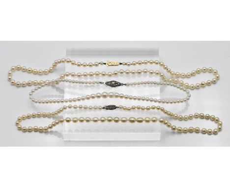 Three Cultured pearl necklaces to include single row with silver clasp, approx. length: 16cm, single row cultured pearl neckl