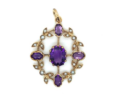 An Edwardian amethyst and seed pearl pendant. Measurements 3.1 x 2.3 cm. Unhallmarked, assessed as 9ct gold. Weight 3.8 grams
