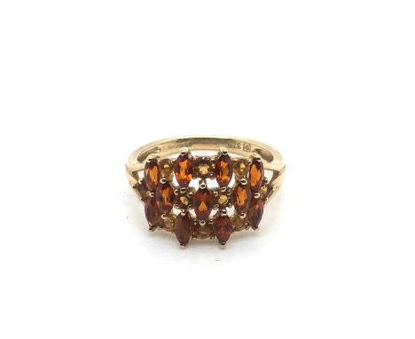 A 9ct hallmarked gold Madeira citrine ring. Ring size K. Weight 2.2 grams.