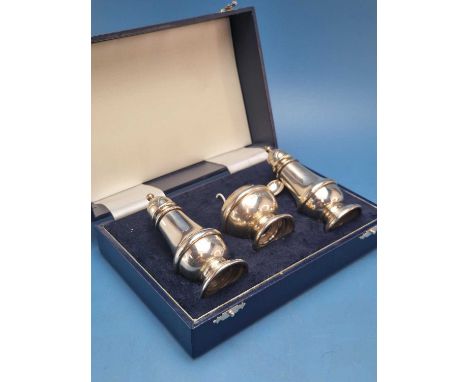 A cased three piece silver condiment set by Harrison Bros and Howson, Birmingham 1997, 113Gms.
