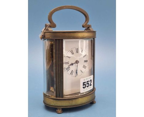 An Antique oval cased 5 glass carriage clock with french timepiece movement. 