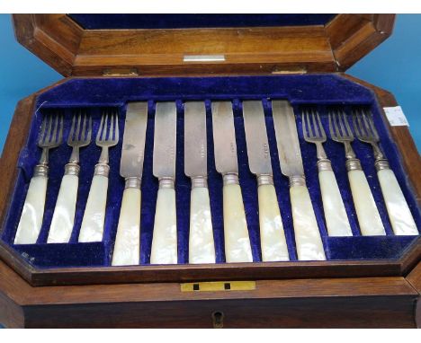 A burr wood canteen of twelve mother of pearl handled silver fruit knives and forks by Elkington &amp; Co., Birmingham 1868