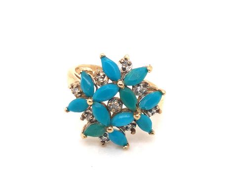 A 9ct hallmarked gold turquoise and diamond multi-stone ring. Ring size K. Weight 2.8 grams.