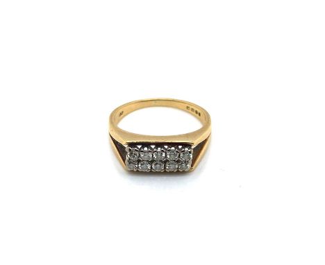An 18ct hallmarked gold diamond dress ring. Ten round brilliant cut diamonds, colour assessed as I/K, clarity VS2/SI1, approx