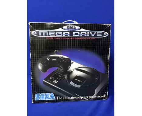 SEGA MEGA DRIVE VIDEO CONSOLEwith approximately 10 games and two controllers; together with a Grandstand Firefox and ZX Sincl