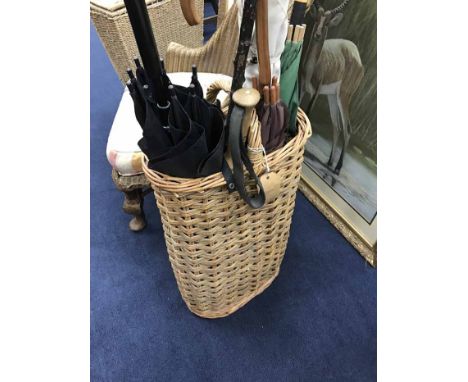 LOT OF WICKER ITEMScomprising basket, chair and stick stand containing various umbrellas etc