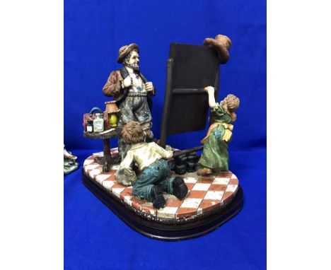 CERAMIC FIGURAL GROUP OF CHILDRENand another figure group