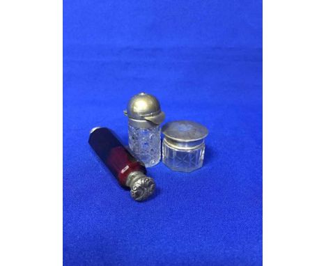 LOT OF 19TH CENTURY AND LATER SCENT BOTTLES AND VIALS to include silver topped and novelty examples, one with the collar mode