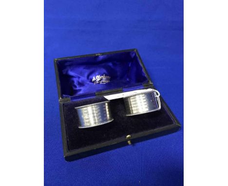 GEORGE III SILVER PUNCH LADLE with London marks 1784; together with pair of George V silver engine turned napkin rings, with 