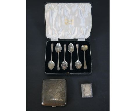 A collection of silver, including five shell design coffee spoons by Atkin Brothers, a silver cigarette case by William Hair 