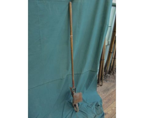 Long handled seed drill with small hopper