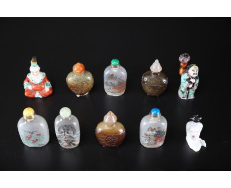 Arte Cinese . A goup of ten snuff bottles  China, 19th - 20th century . A porcelain naked figure snuff bottle and stopper wit