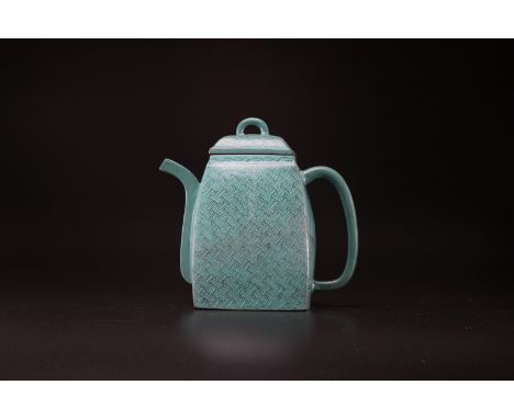 Arte Cinese . Lidded Yixing teapot with green enamel decorated with geometric patterns and vegetal motifs and bearing an inci