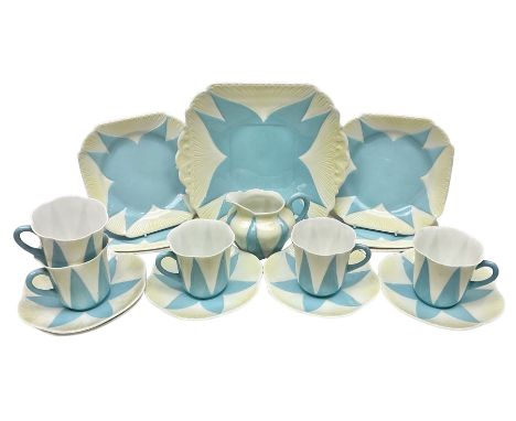 Shelley Dainty pattern tea wares, of lobed form with blue star decoration on merging white and yellow ground, comprising five