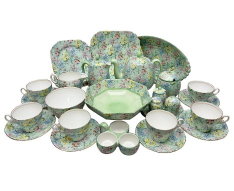 Shelley Melody pattern tea service for six, to include teapot, teapot stand, hot water jug, milk jug, covered sucrier, teacup