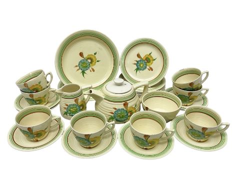 Wilkinson Clarice Cliff honeydew pattern tea service for eight, comprising teapot, milk jug, open sucrier, teacup and saucers