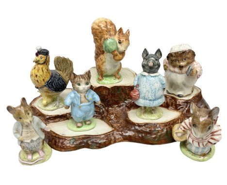 Seven Beswick Beatrix Potter figures, comprising Sally Henny Penny, Johnny Town-Mouse, Mrs Tiggy-Winkle, Mrs Tittlemouse, Tom