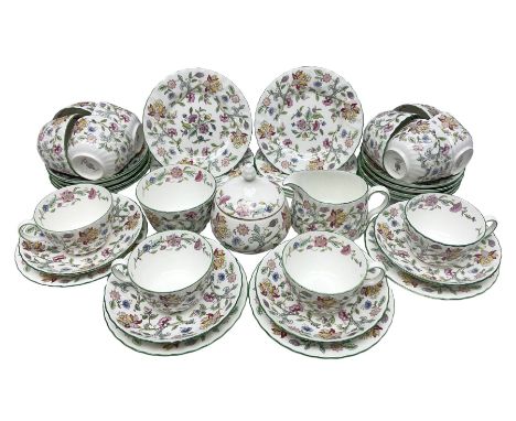 Minton Haddon Hall pattern tea wares comprising twelve teacup trios, milk jug, lidded bowl and sucrier