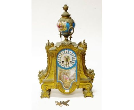 Antique French painted ceramic ormolu mantel clock decorated with a hand painted classical scene to body, and birds and bloss
