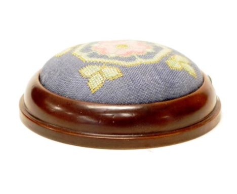 Vintage tapestry covered pin cushion circular tapestry covered pin cushion, on fitted wood base, (diameter 12cm approx).