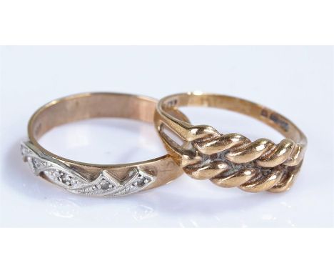 Two 9 carat gold rings, the first with rope twist design, the second with swirl front, total weight 4.5 grams, (2)