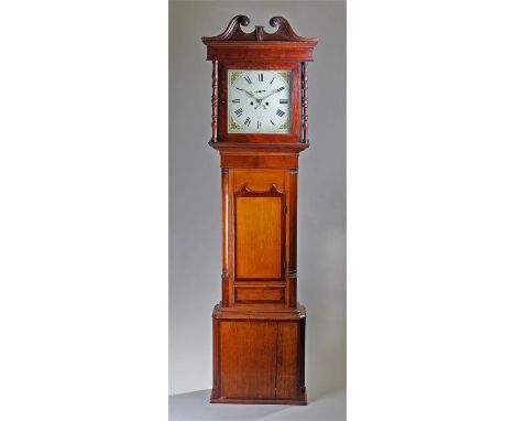 18th Century oak and mahogany longcase clock. The swan neck pediment above a glazed hood and turned columns, long trunk door 