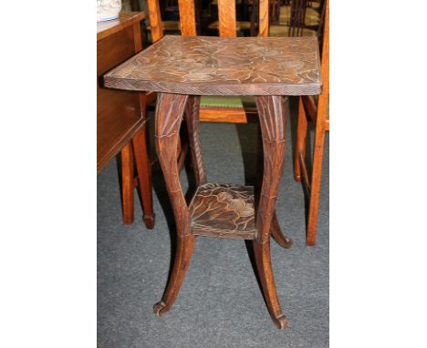 A 20th century foliate carved occasional table, with square top and under shelf, on outswept legs, 45.5cm