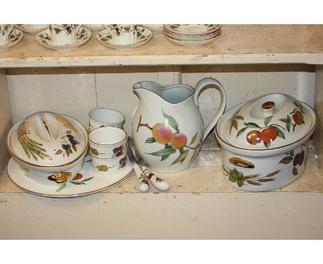 A collection of Royal Worcester Evesham pattern oven to tableware comprising lidded tureen and vegetable dish, jug, serving p
