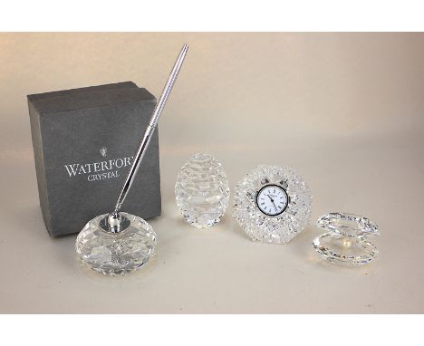 A Waterford crystal pen stand with ball point pen, boxed, together with a Waterford crystal clock and two other items