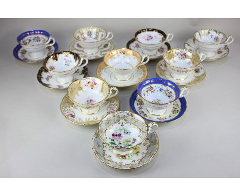 A Harlequin set of ten similar porcelain cups and saucers, all with floral designs and gilt embellishment, in various colours