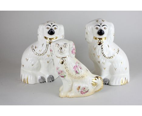 A pair of Beswick Old English dogs (Model 1378/4) from the Mantelpiece series, together with a Blackeney fireside spaniel, ta