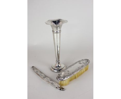 A George V silver bud vase, maker Robert Pringle & Sons, Chester 1929, a silver comb mount, Birmingham 1911, with a matching 