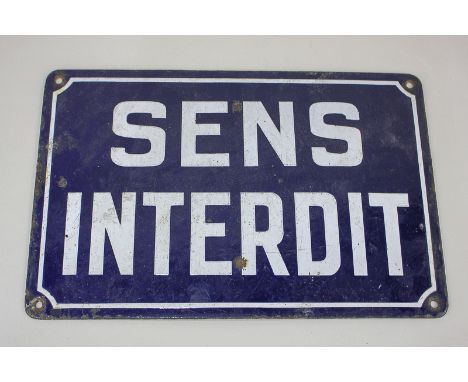 A French enamel sign in white on blue ground, reading 'Sens Interdit', 20cm by 30cm