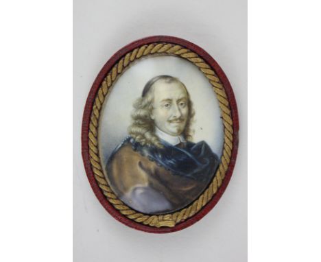 An 18th century portrait miniature of a gentleman, on ivory, head and shoulders portrait dressed in red and blue with grey cu