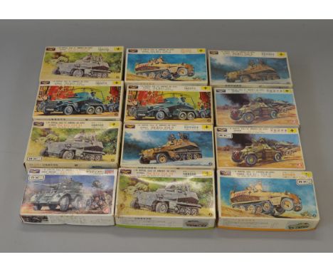 12 x KSN 1:40 scale military model kits. Viewing recommended