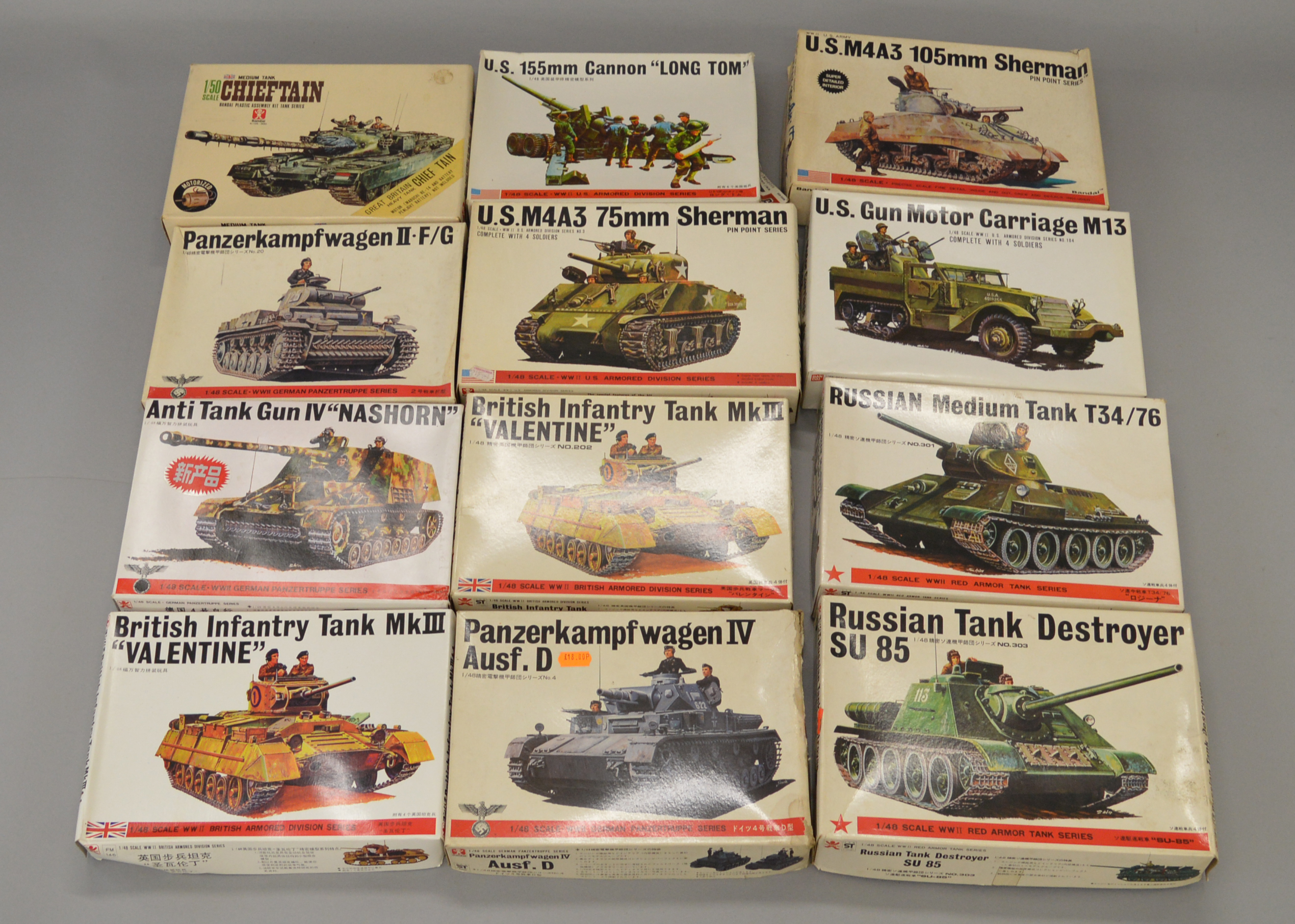 12 x Bandai 148 scale military model kits. Viewing