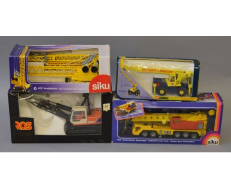 Four boxed diecast model Construction vehicles including  Siku 4112 Crane, Siku 4010 Hydraulic Crane Truck and Corgi 1101 War