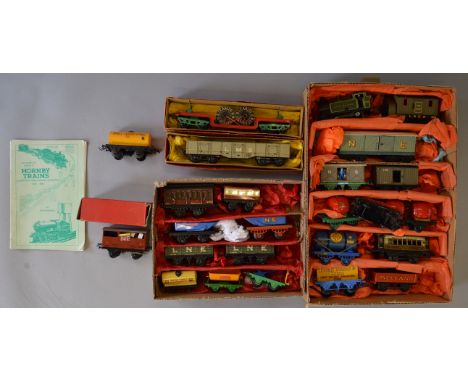 O Gauge Hornby 0-4-0 GWR c/work tank engine No. 6600, together with 22 x assorted rolling stock, some repainted. Condition ra