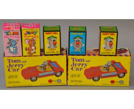 Two Marx plastic 'Tom and Jerry' Cars with 'push and go' mechanism together with five 'mechanical walking toys', also by Marx