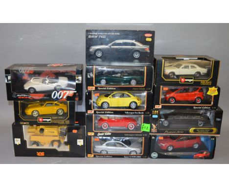 Eleven boxed diecast model cars in 1:18 scale by Kyosho, Maisto, Bburago and others including an AUTOart 007 Toyota 2000GT. A