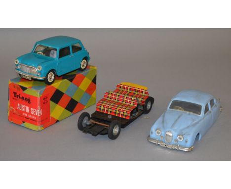 A boxed plastic battery operated Triang Austin Seven in 1:20 scale, plastic glazing unit has warped and dropped otherwise app